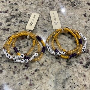 Set of 2 NWT purple, yellow and gold stretch beaded “Game Day” bracelets